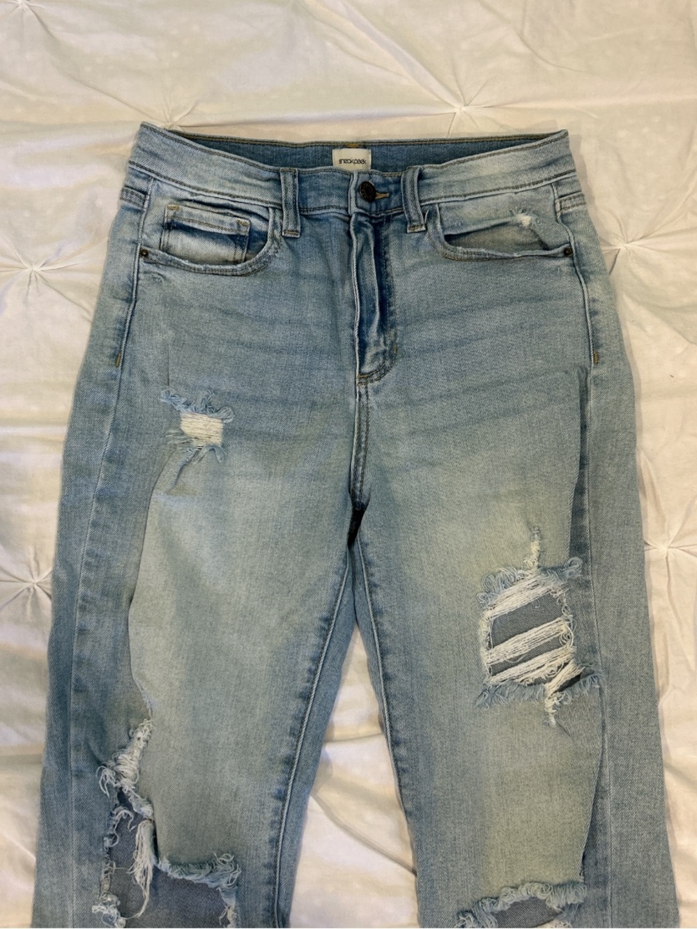Sneak Peak Light Wash Ripped Skinny Jean